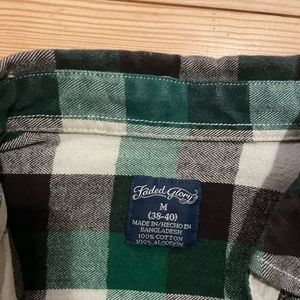 Emerald green flannel. Faded glory brand size medium.